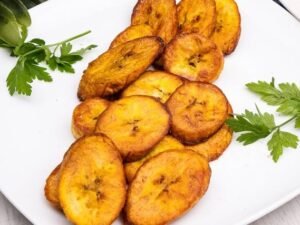 Fried plantain served in a white dish