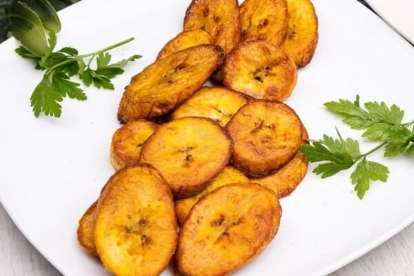 Fried plantain served in a white dish