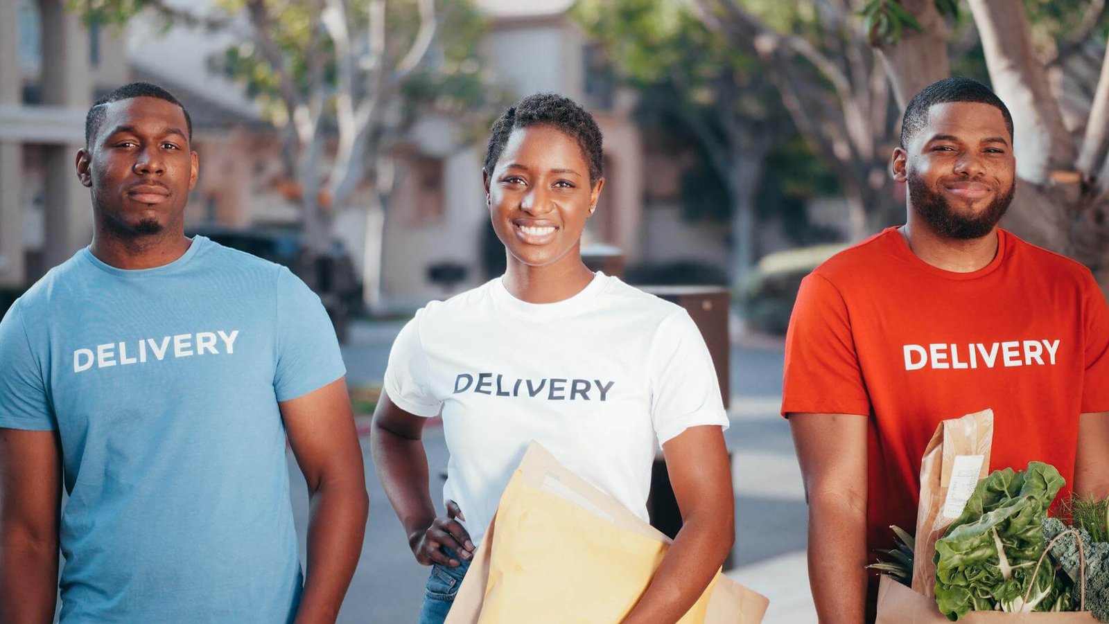 Three people working in a delivery service